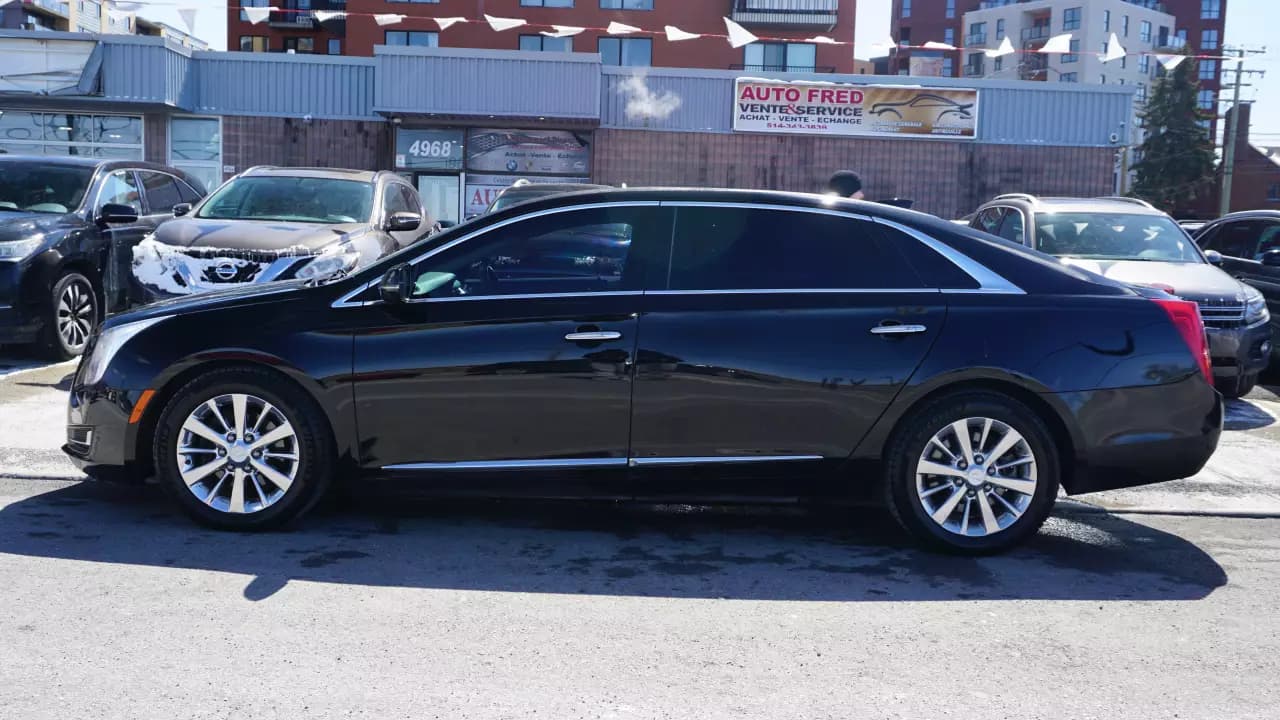 CADILLAC XTS Limousine 2016https://cdn.drivegood.com/PmJ0PzhEpqiXxlJACxQqzML67Js1NAkcYgRG1mCC.webp