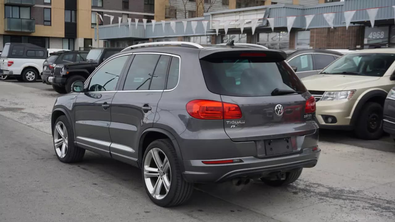 VOLKSWAGEN Tiguan Rline 2015https://cdn.drivegood.com/do09m036e3CM7pMSpnYrtRCC6wQ7yWm0rgruREFs.webp